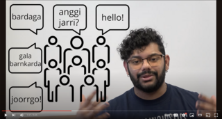 Screenshot of video. Icons of people are shown with speech bubbles in Barrdi and English.